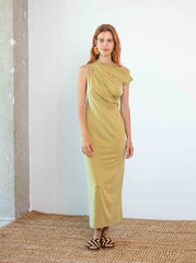 Woman wearing the cupro drape midi dress in soft olive showing modern 7/8 midi length by Cossac
