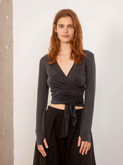 Cupro multiway wrap top in slate black styled with front wrap configuration by Cossac